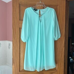 BCX size Medium. Aqua blue dress, slip with sheer overlay